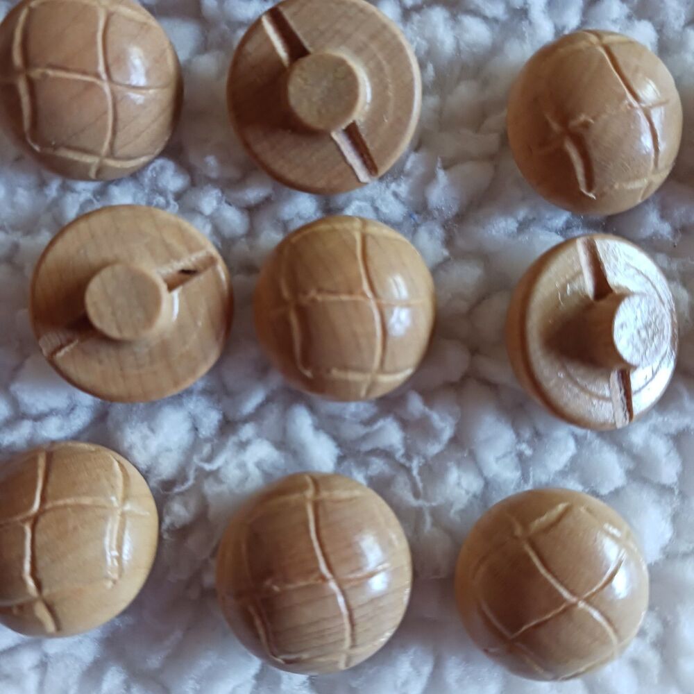 28 wood looking buttons from the 70s with a shank aproximately 3/4 in.